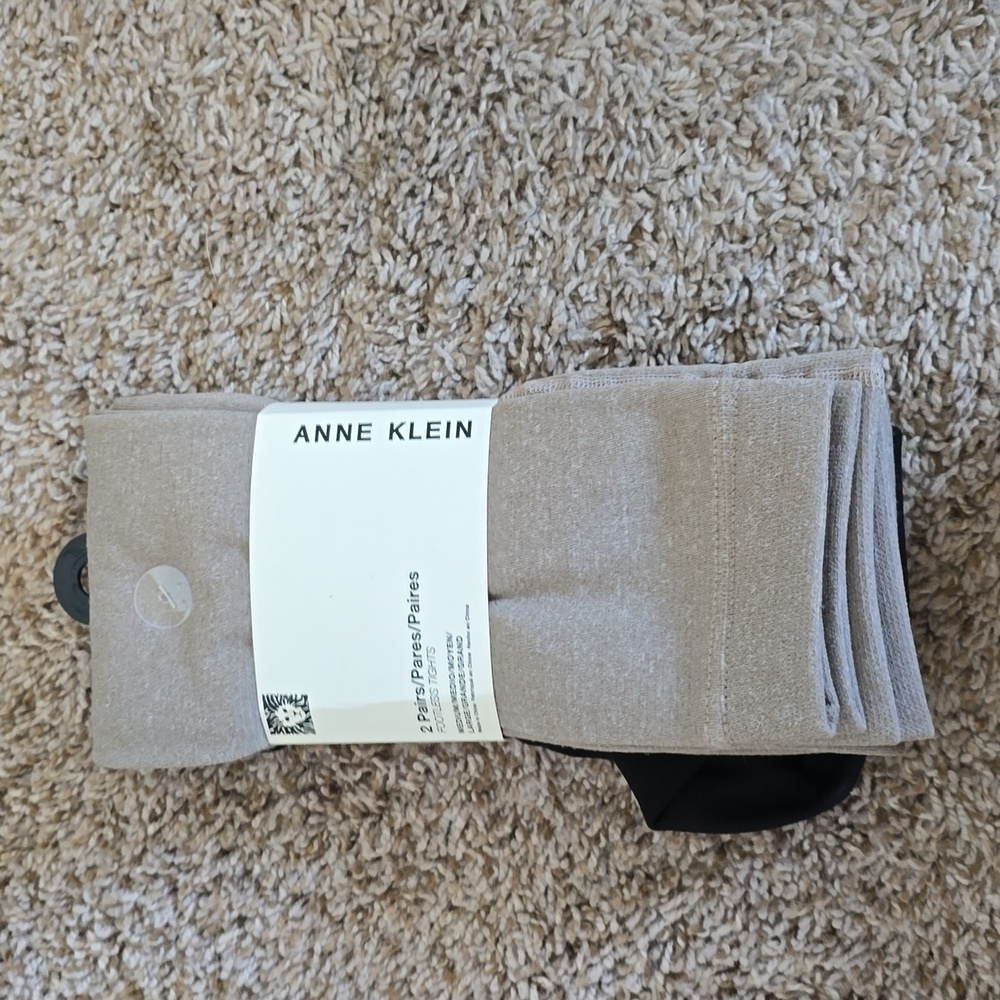 Two pairs medium footless tights Anne Klein